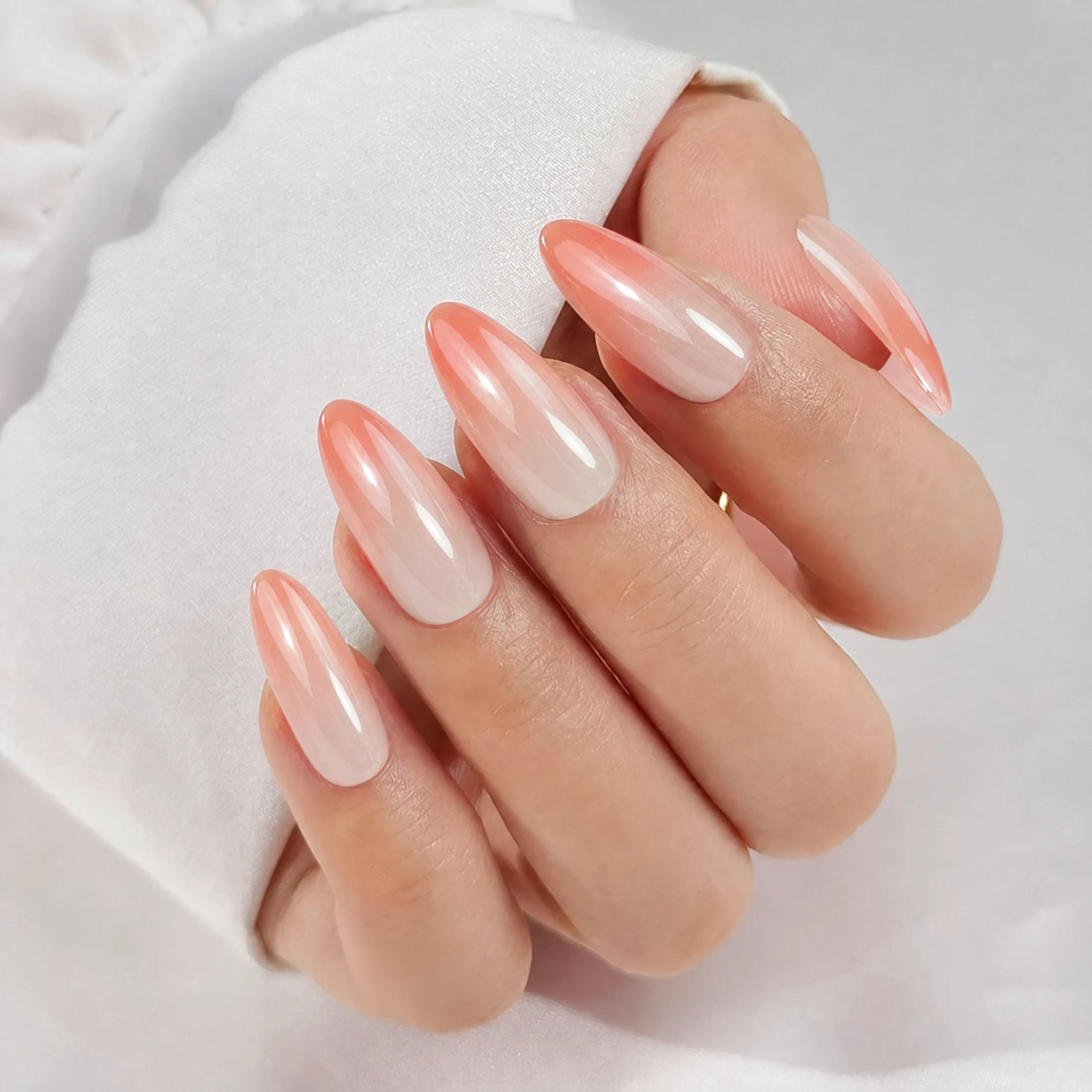 Look of the short, press-on cat-eye nail tips when worn.
